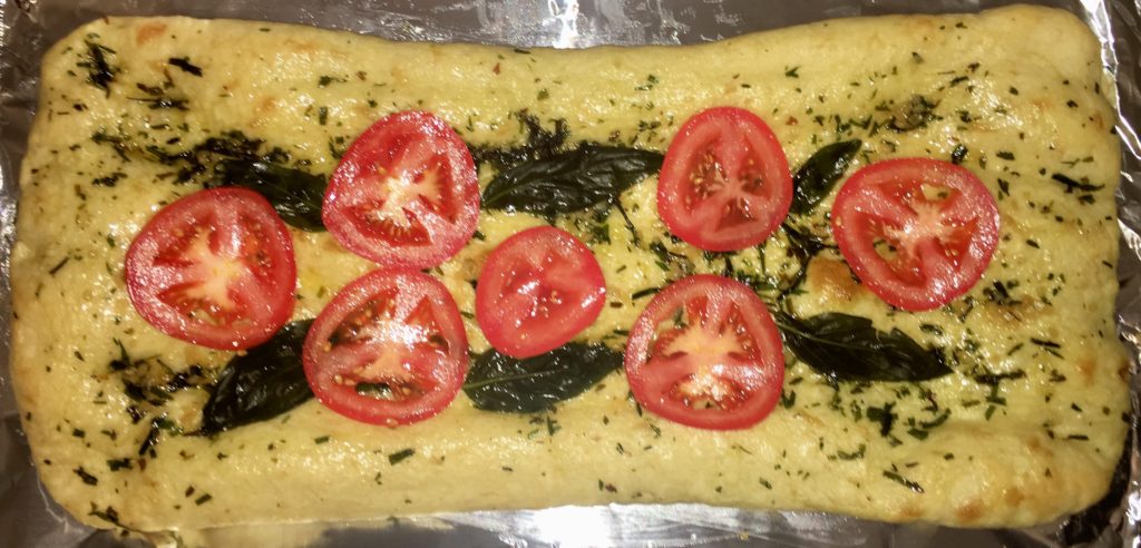Fokachio bread with tomato, basil, garlic and olive oil
