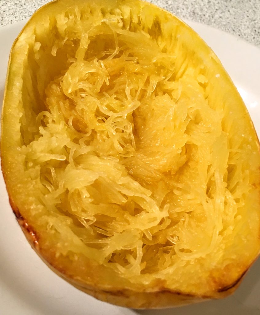 Baked Spaghetti Squash made stringy with a fork