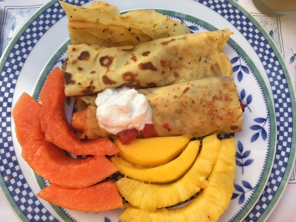 Mango, Papaya, Pineapple and Fresh Crepes topped with coconut whipped cream