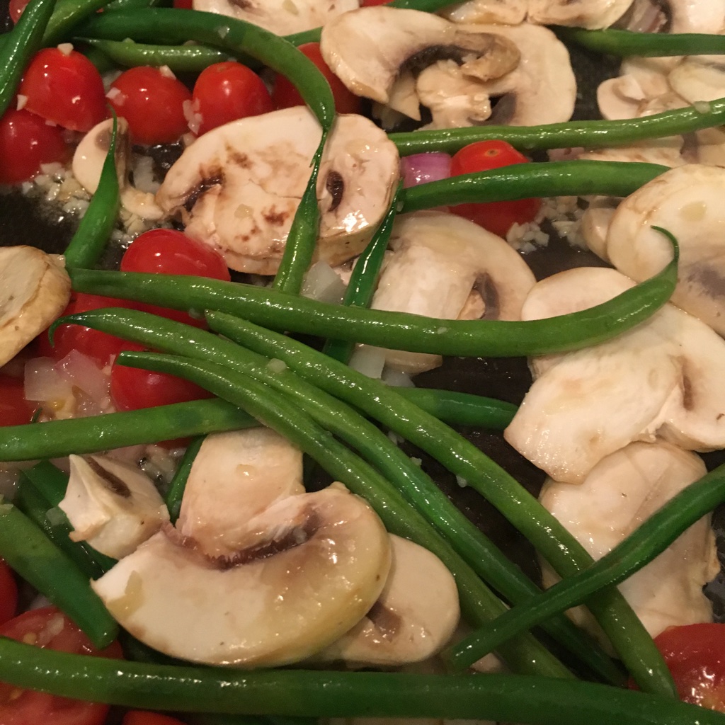 Pan fried mushrooms, cherry tomatoes, green beans, garlic and pearl red onions